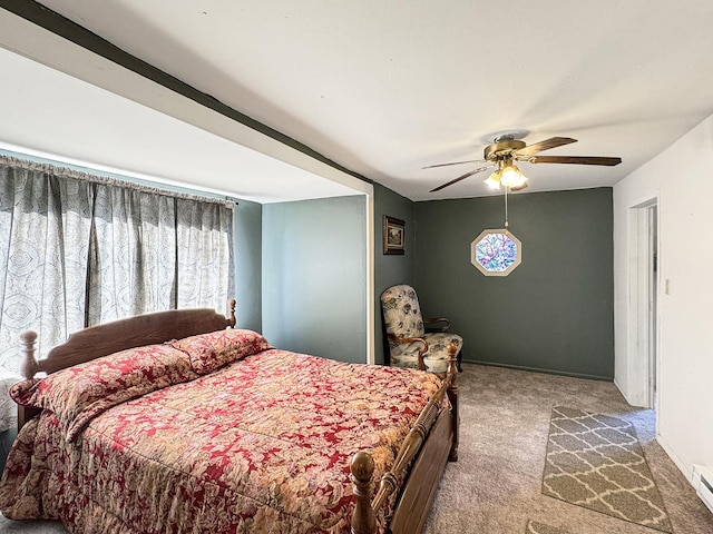 725 Opal St, Marseilles, IL 61341 - bedroom with carpet floors, a baseboard radiator, and a ceiling fan