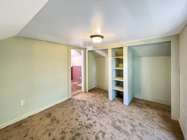 725 Opal St, Marseilles, IL 61341 - unfurnished bedroom with vaulted ceiling, carpet floors, and a closet