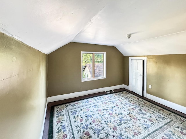 725 Opal St, Marseilles, IL 61341 - additional living space featuring vaulted ceiling and baseboards