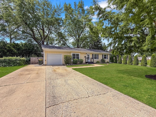 328 Thunderbird Trl, Carol Stream, IL 60188 - view of front of property featuring an attached garage, concrete driveway, a front lawn, and board and batten siding