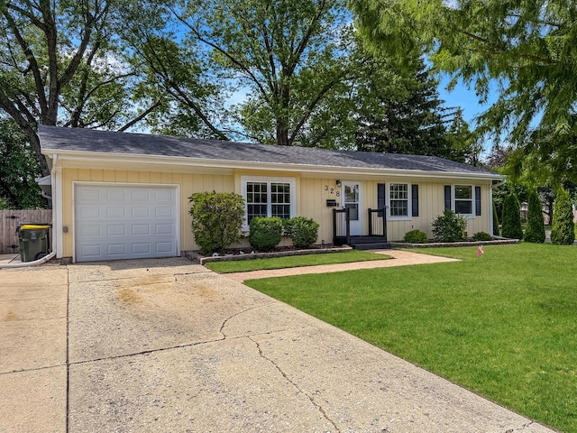 328 Thunderbird Trl, Carol Stream, IL 60188 - single story home featuring a garage, a front lawn, and concrete driveway