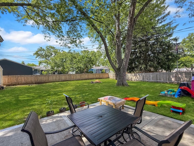 328 Thunderbird Trl, Carol Stream, IL 60188 - fenced backyard featuring outdoor dining space and a patio