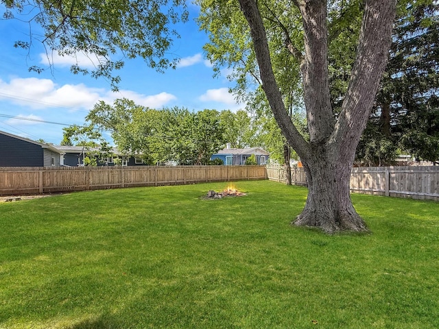 328 Thunderbird Trl, Carol Stream, IL 60188 - fenced backyard featuring a fire pit