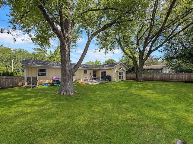 328 Thunderbird Trl, Carol Stream, IL 60188 - rear view of property featuring a fenced backyard, board and batten siding, and a patio