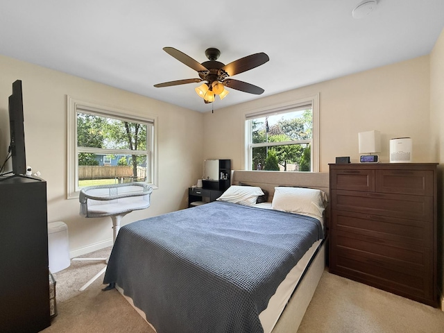328 Thunderbird Trl, Carol Stream, IL 60188 - bedroom featuring light carpet, multiple windows, and ceiling fan