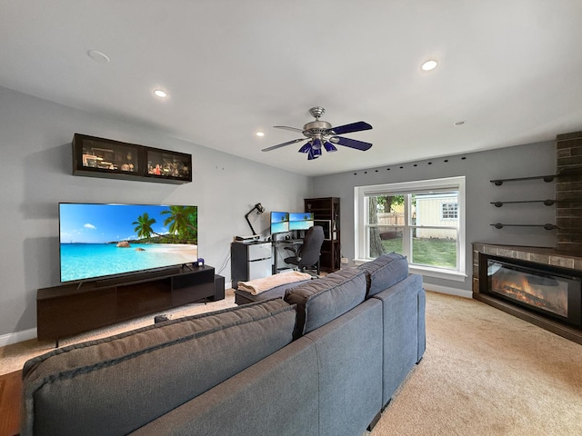 328 Thunderbird Trl, Carol Stream, IL 60188 - living area with a glass covered fireplace, a desk, ceiling fan, light colored carpet, and recessed lighting