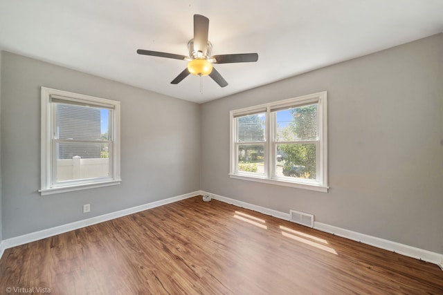 15 Ridge Rd, Lemont, IL 60439 - spare room featuring wood finished floors and a ceiling fan