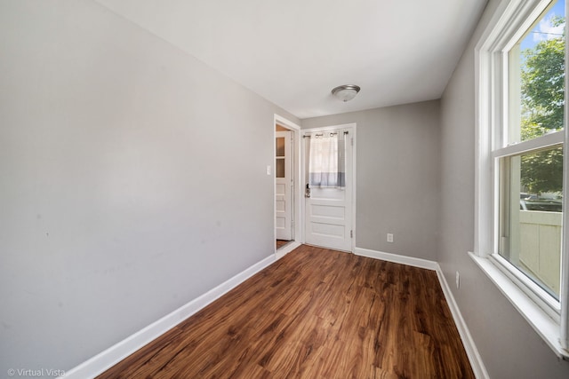 15 Ridge Rd, Lemont, IL 60439 - unfurnished room featuring baseboards and dark wood-style flooring