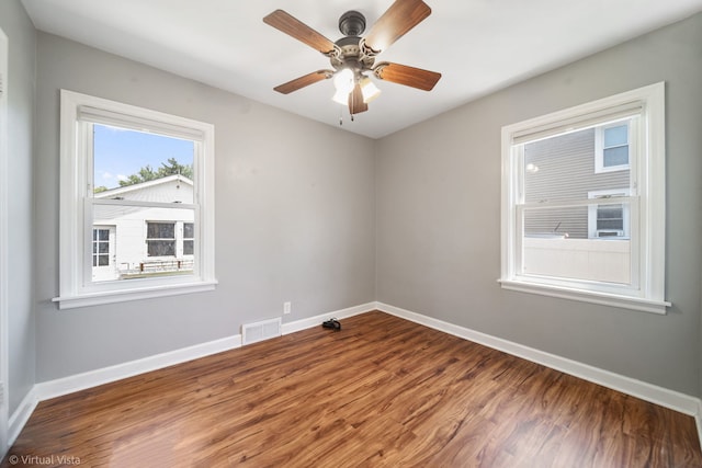 15 Ridge Rd, Lemont, IL 60439 - spare room with wood finished floors and ceiling fan