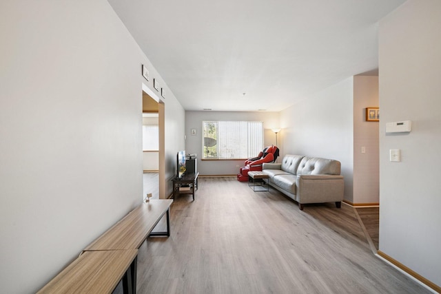 941 N Swift Rd Unit 201, Addison, IL 60101 - living area with light wood-type flooring