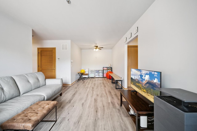 941 N Swift Rd Unit 201, Addison, IL 60101 - living room featuring wood finished floors and a ceiling fan