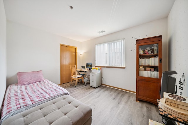 941 N Swift Rd Unit 201, Addison, IL 60101 - bedroom with light wood-type flooring