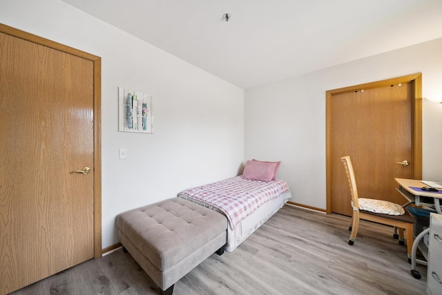 941 N Swift Rd Unit 201, Addison, IL 60101 - bedroom with light wood-style floors and baseboards