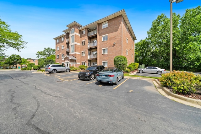 941 N Swift Rd Unit 201, Addison, IL 60101 - view of apartment building / complex with uncovered parking