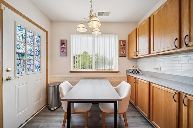 941 N Swift Rd Unit 201, Addison, IL 60101 - dining area with dark wood-style floors and a chandelier