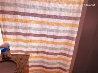 2651 E 74th St Unit 201, Chicago, IL 60649 - bathroom with curtained shower