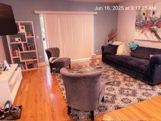 2651 E 74th St Unit 201, Chicago, IL 60649 - living area with wood finished floors and baseboards