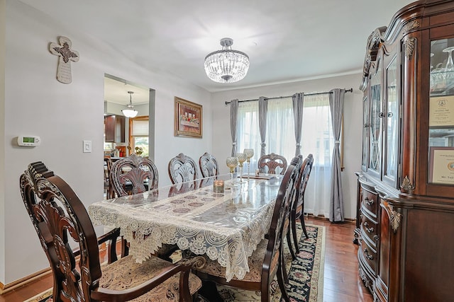 1008 S Beechwood Dr, Mount Prospect, IL 60056 - dining space with a chandelier, plenty of natural light, and dark wood-type flooring
