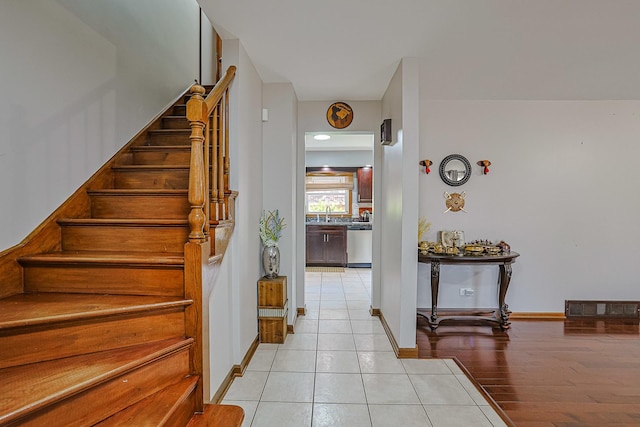 1008 S Beechwood Dr, Mount Prospect, IL 60056 - stairs with tile patterned flooring and baseboards