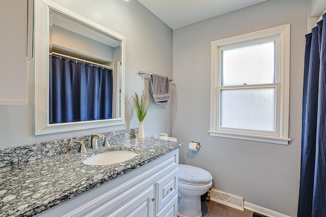 1008 S Beechwood Dr, Mount Prospect, IL 60056 - bathroom with vanity, healthy amount of natural light, tile patterned flooring, and curtained shower