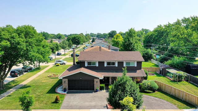 1008 S Beechwood Dr, Mount Prospect, IL 60056 - traditional-style home with asphalt driveway, brick siding, and a shingled roof