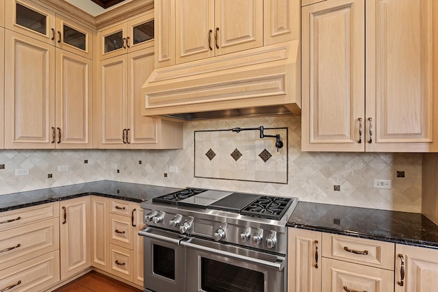 23 Enclave Ct, South Barrington, IL 60010 - kitchen featuring range with two ovens, dark stone counters, and decorative backsplash