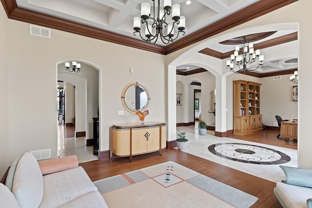 23 Enclave Ct, South Barrington, IL 60010 - living area with a chandelier, arched walkways, coffered ceiling, ornamental molding, and beam ceiling