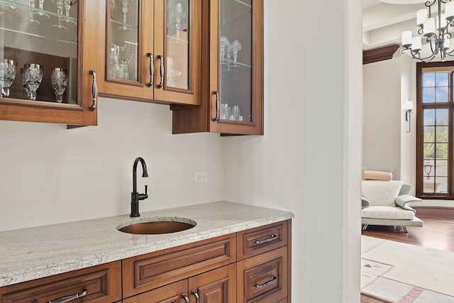 23 Enclave Ct, South Barrington, IL 60010 - bar featuring a chandelier and hanging light fixtures