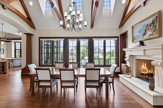 23 Enclave Ct, South Barrington, IL 60010 - dining area featuring a high end fireplace, high vaulted ceiling, a chandelier, dark wood-type flooring, and beamed ceiling