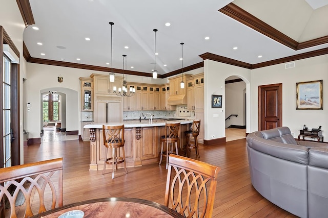 23 Enclave Ct, South Barrington, IL 60010 - dining room featuring arched walkways, dark wood-style floors, crown molding, and recessed lighting