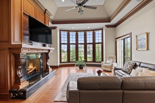 23 Enclave Ct, South Barrington, IL 60010 - living area with light wood finished floors, a premium fireplace, crown molding, a ceiling fan, and recessed lighting