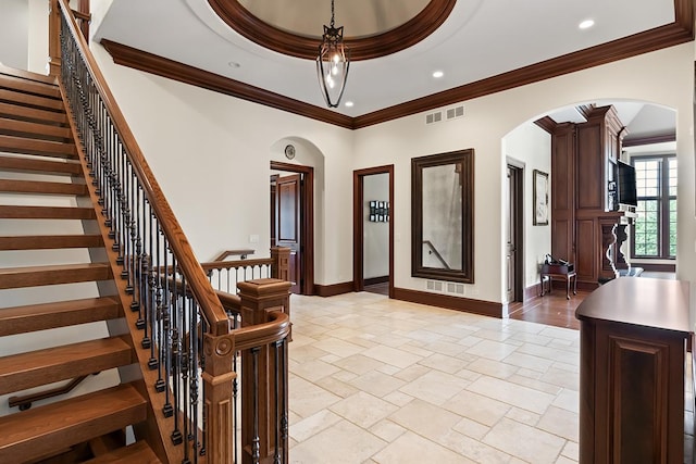 23 Enclave Ct, South Barrington, IL 60010 - entrance foyer with arched walkways, ornamental molding, stairs, recessed lighting, and stone tile floors