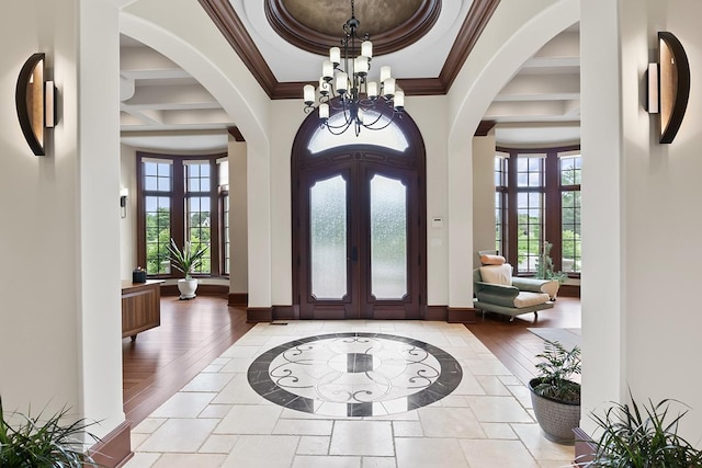 23 Enclave Ct, South Barrington, IL 60010 - entryway with arched walkways, a chandelier, ornamental molding, coffered ceiling, and beamed ceiling