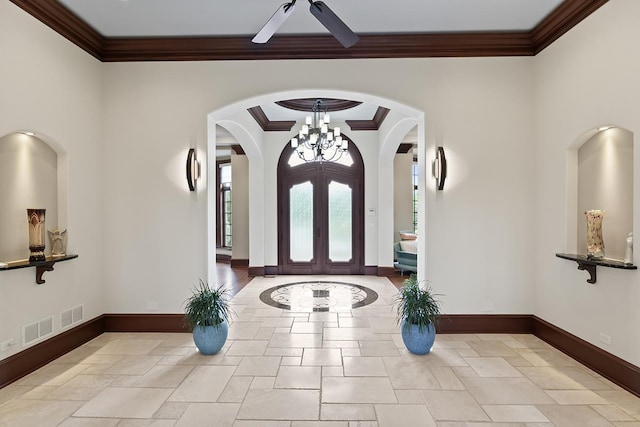 23 Enclave Ct, South Barrington, IL 60010 - entryway featuring crown molding, arched walkways, a ceiling fan, and a chandelier