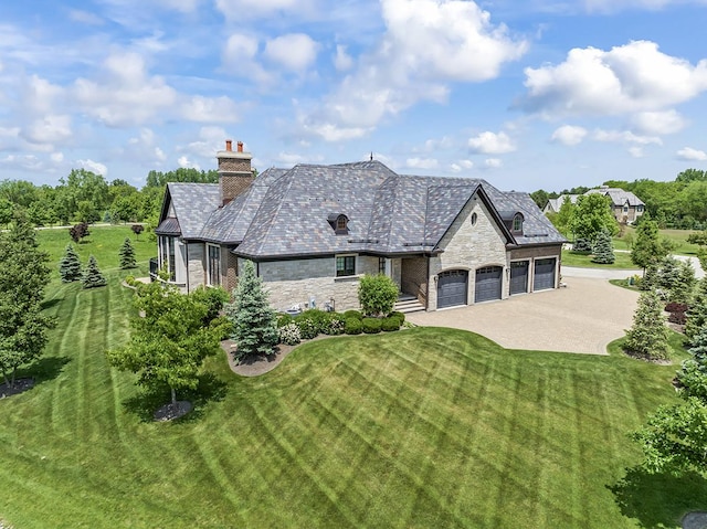 23 Enclave Ct, South Barrington, IL 60010 - french provincial home featuring a high end roof, stone siding, a front lawn, and a chimney