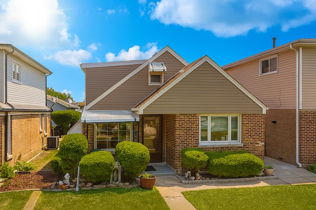 1531 N 24th Ave, Melrose Park, IL 60160 - traditional home with brick siding and a front lawn