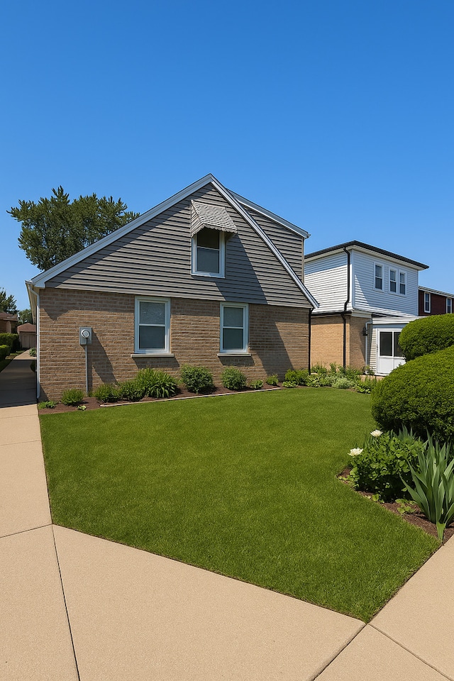 1531 N 24th Ave, Melrose Park, IL 60160 - view of front facade with a front lawn and brick siding