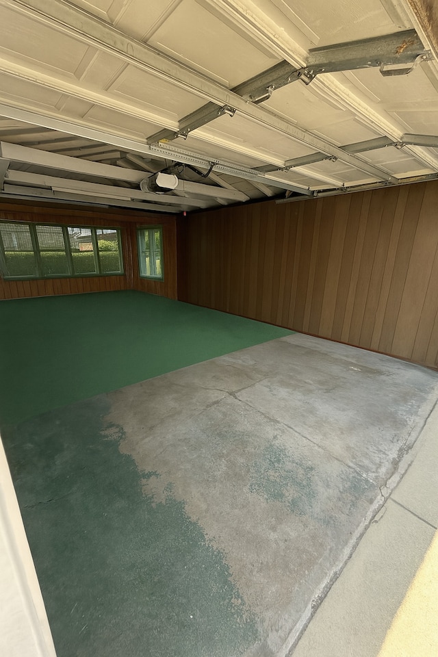 1531 N 24th Ave, Melrose Park, IL 60160 - garage featuring wooden walls and a garage door opener