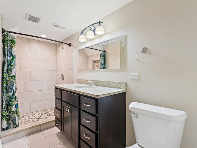 240 N Park Dr, Glenwood, IL 60425 - bathroom with vanity, a tile shower, tile patterned flooring, and recessed lighting