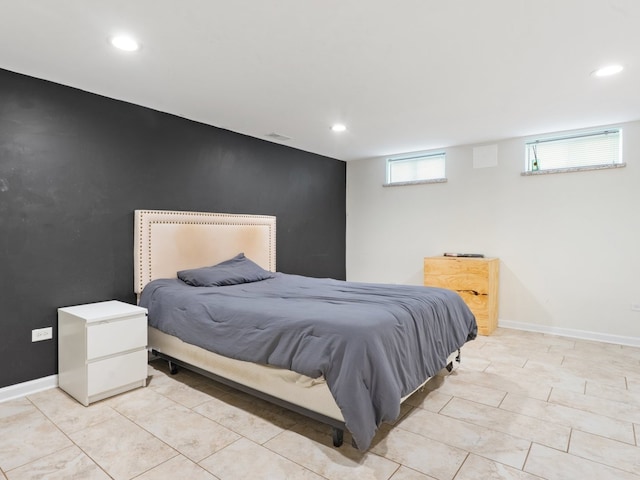 240 N Park Dr, Glenwood, IL 60425 - tiled bedroom featuring recessed lighting and an accent wall