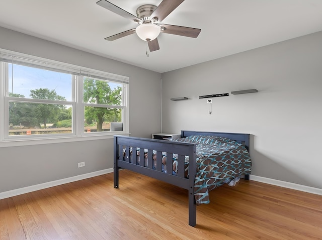 240 N Park Dr, Glenwood, IL 60425 - bedroom with wood finished floors and ceiling fan