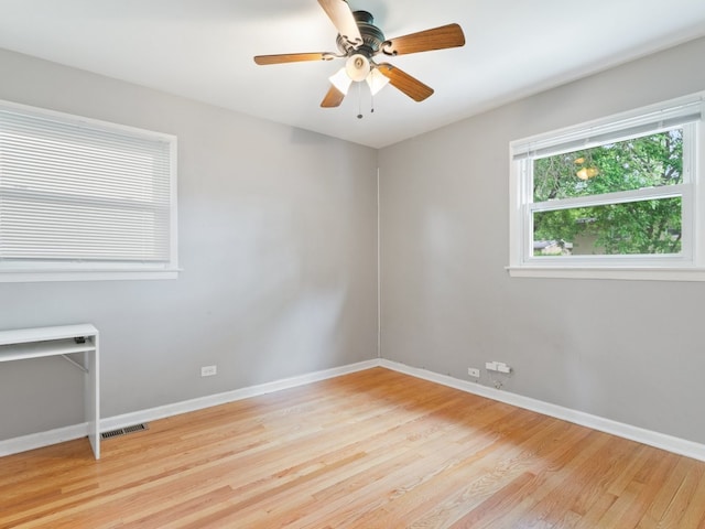 240 N Park Dr, Glenwood, IL 60425 - spare room featuring light wood finished floors and ceiling fan