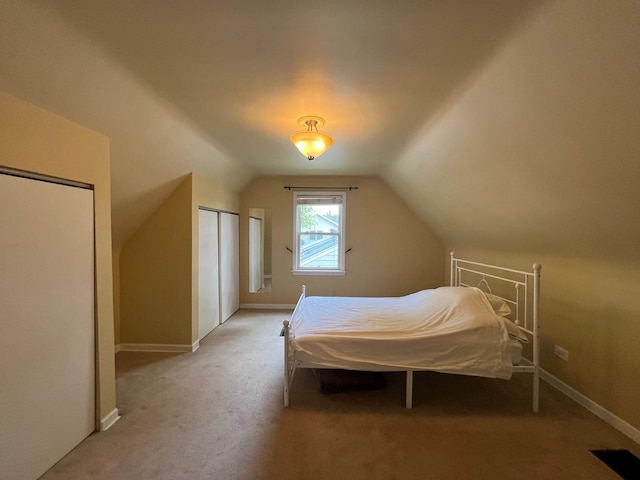 4225 Highland Ave, Downers Grove, IL 60515 - bedroom with vaulted ceiling and light carpet