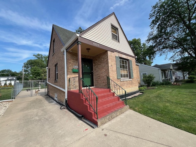 4225 Highland Ave, Downers Grove, IL 60515 - bungalow-style house with brick siding and a gate