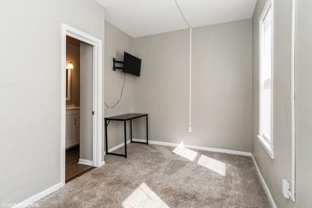 555 S Lasalle St, Aurora, IL 60505 - unfurnished bedroom featuring carpet and baseboards