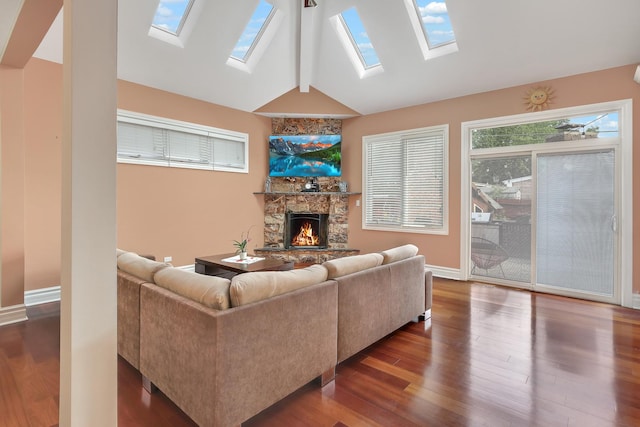 8453 W Bruce Dr, Niles, IL 60714 - living area with a skylight, a stone fireplace, and wood finished floors