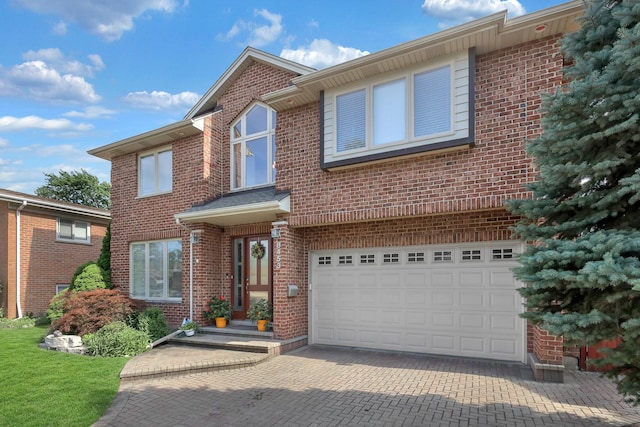 8453 W Bruce Dr, Niles, IL 60714 - traditional-style home featuring a garage, brick siding, and decorative driveway