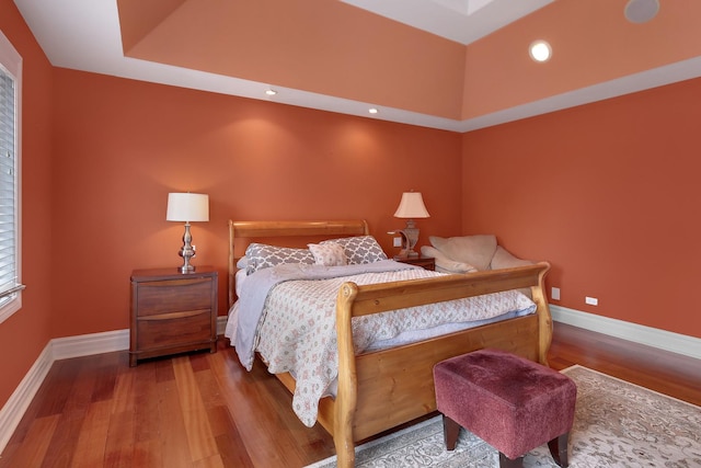 8453 W Bruce Dr, Niles, IL 60714 - bedroom with wood finished floors, recessed lighting, and a tray ceiling