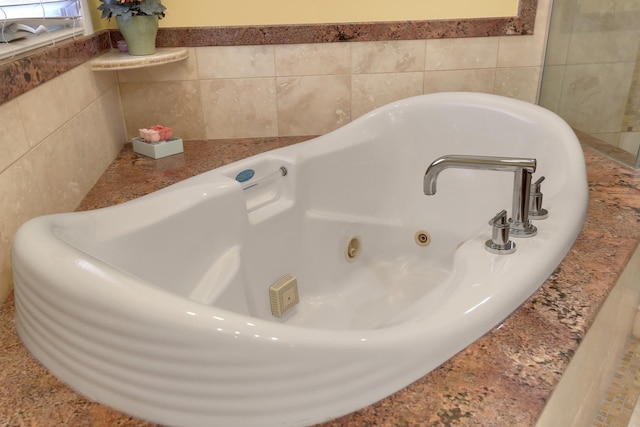 8453 W Bruce Dr, Niles, IL 60714 - bathroom with a jetted tub and tile walls