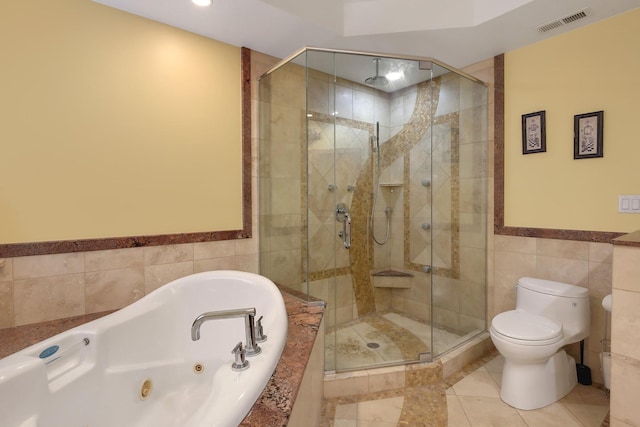 8453 W Bruce Dr, Niles, IL 60714 - full bathroom featuring tile walls, a stall shower, a jetted tub, a wainscoted wall, and tile patterned floors